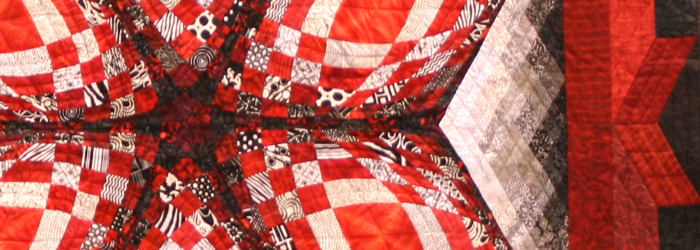 detail of geometric star quilt